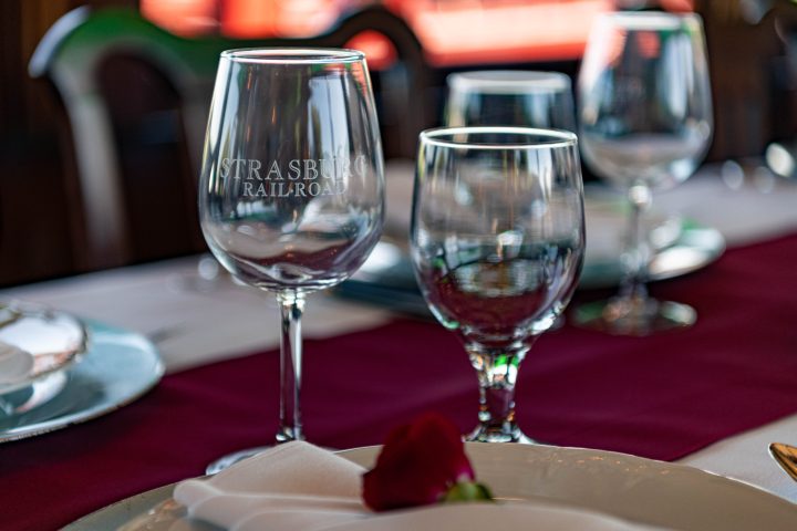 An elegant view of wine glasses on a table.